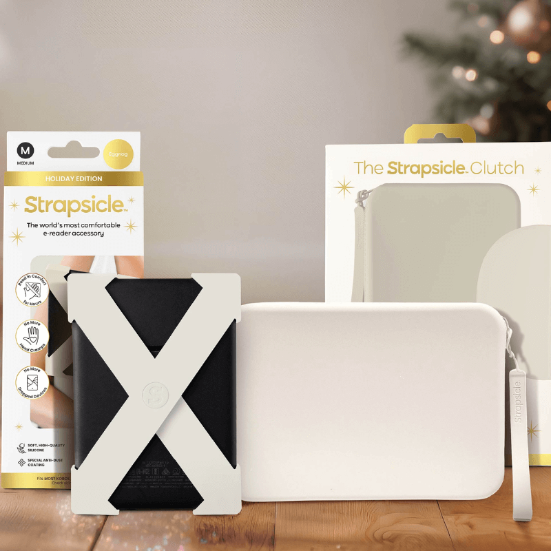 A eggnog straps and clutch with packaging on a wooden surface with blurred lights in the background