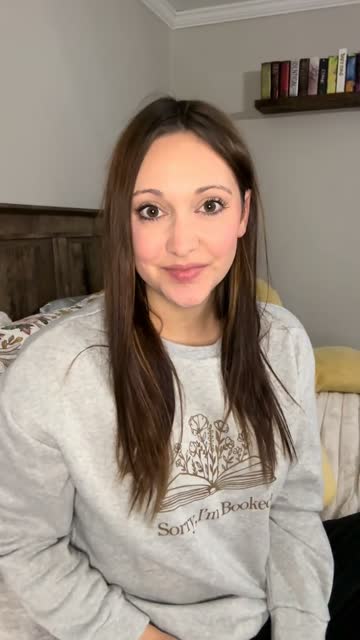 Reader talking to camera about her candy pink Strapsicle straps